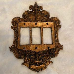 Fleur de lis Old World light switch triple cover.